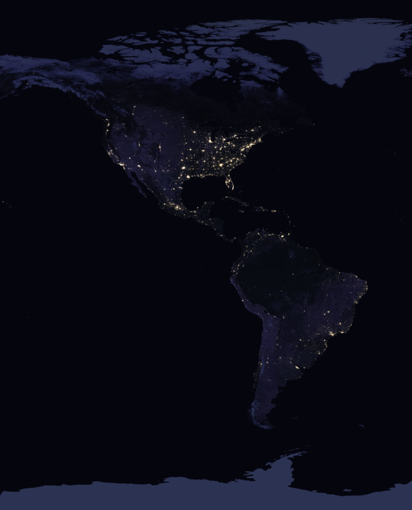Image of the Earth as seen from space. North America is well-lit compared to South America. It illustrates a difficulty of applying machine learning to satellite imagery--not all places are equally visible.