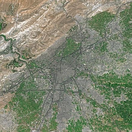 A 2006 satellite image of Damascus, Syria. Machine learning applied to such imagery is used in disaster relief an raises many ethical questions. 